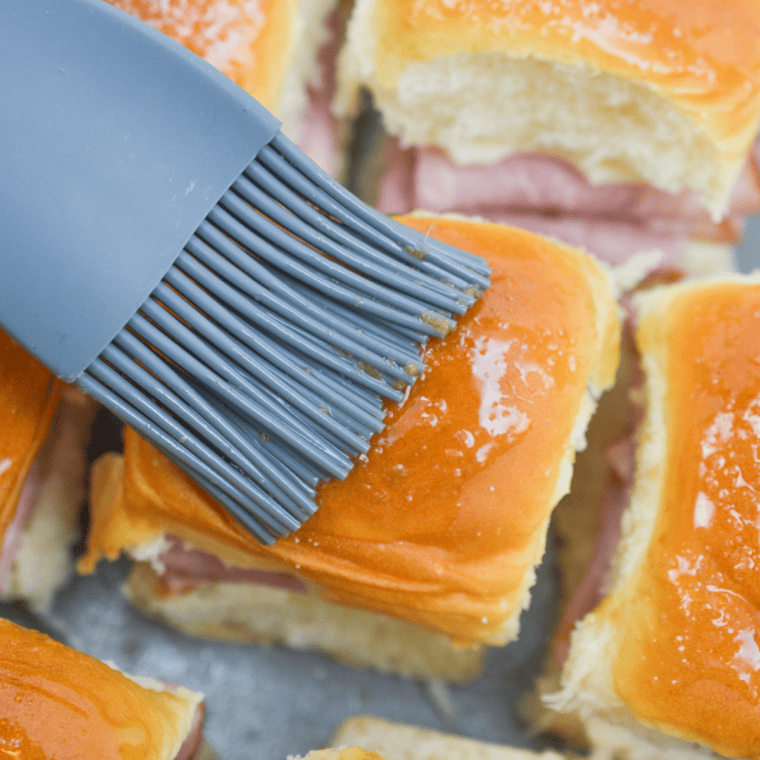 Golden-brown Hawaiian ham and cheese sliders fresh out of the air fryer basket.