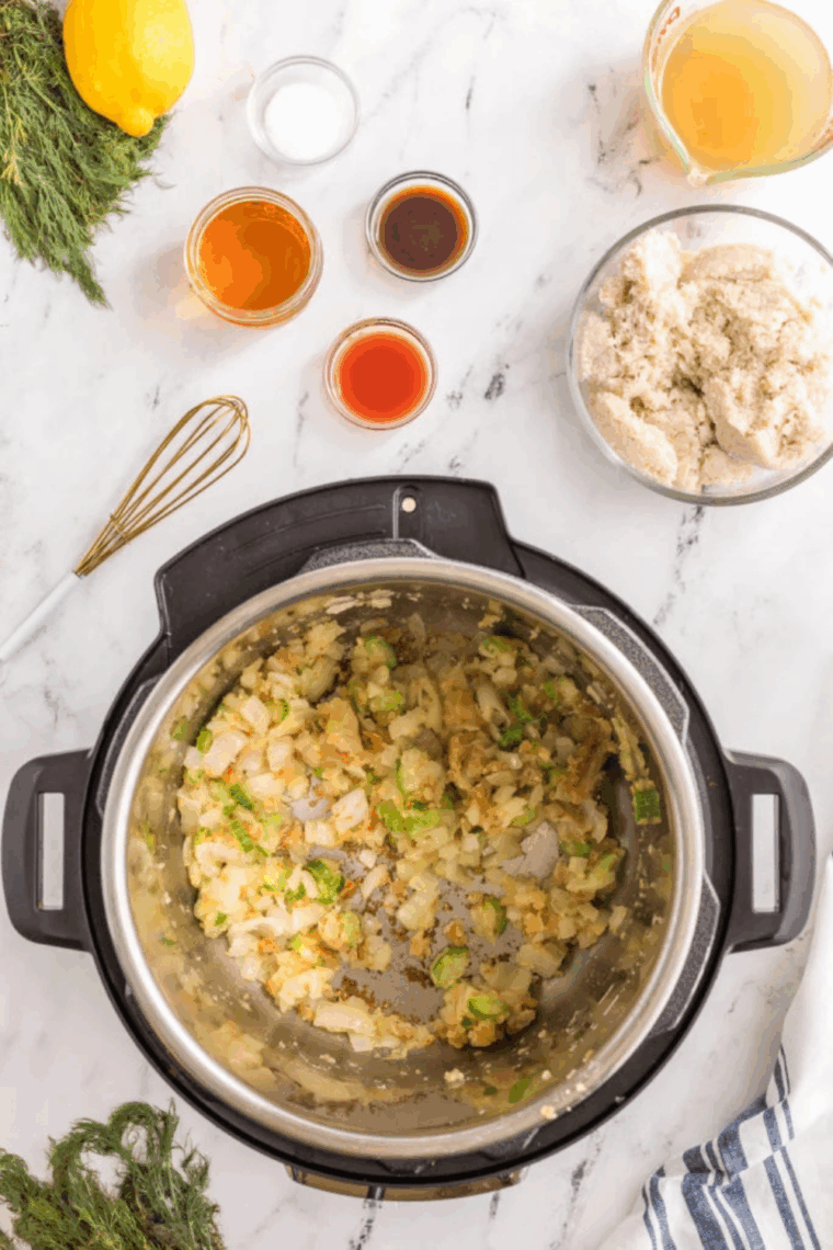 Whisking half-and-half, cream, and broth in Instant Pot, then adding sherry and seasonings