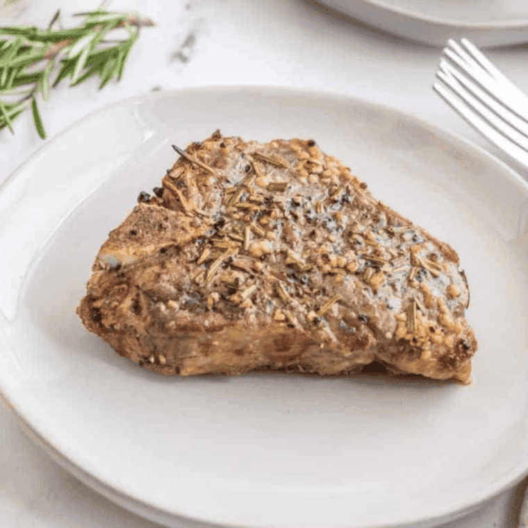 Plate of Air Fryer Rosemary Garlic Lamb Chops.