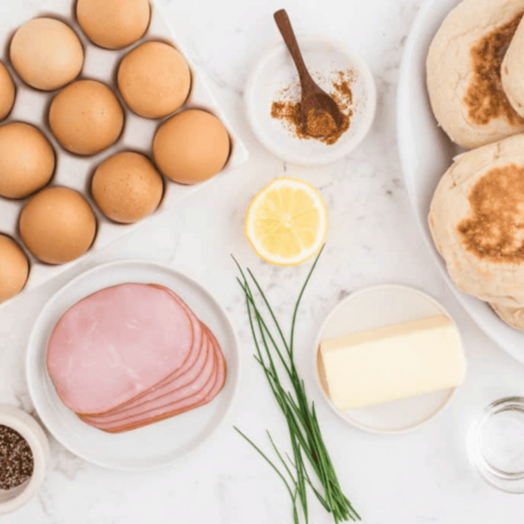 Ingredients needed for Easy Air Fryer Eggs Benedict on kitchen table.