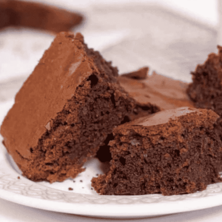 Fudgy air fryer boxed brownies cut into squares on parchment paper