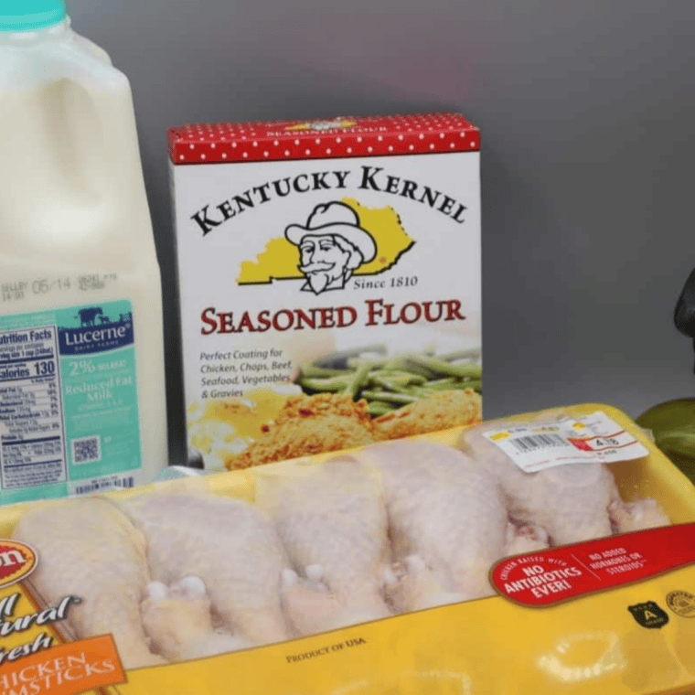 Ingredients for air fryer Kentucky Kernel fried chicken: raw chicken, buttermilk, and Kentucky Kernel seasoned flour