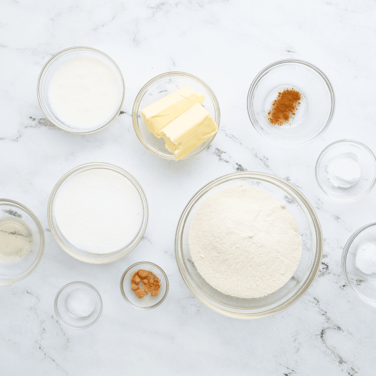 Ingredients needed for Air Fryer Date and Walnut Bread on kitchen table.