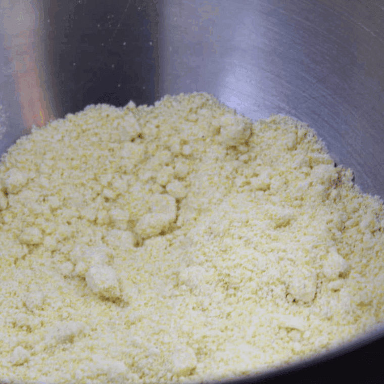 Pour the Jiffy Mix into the mixing bowl.