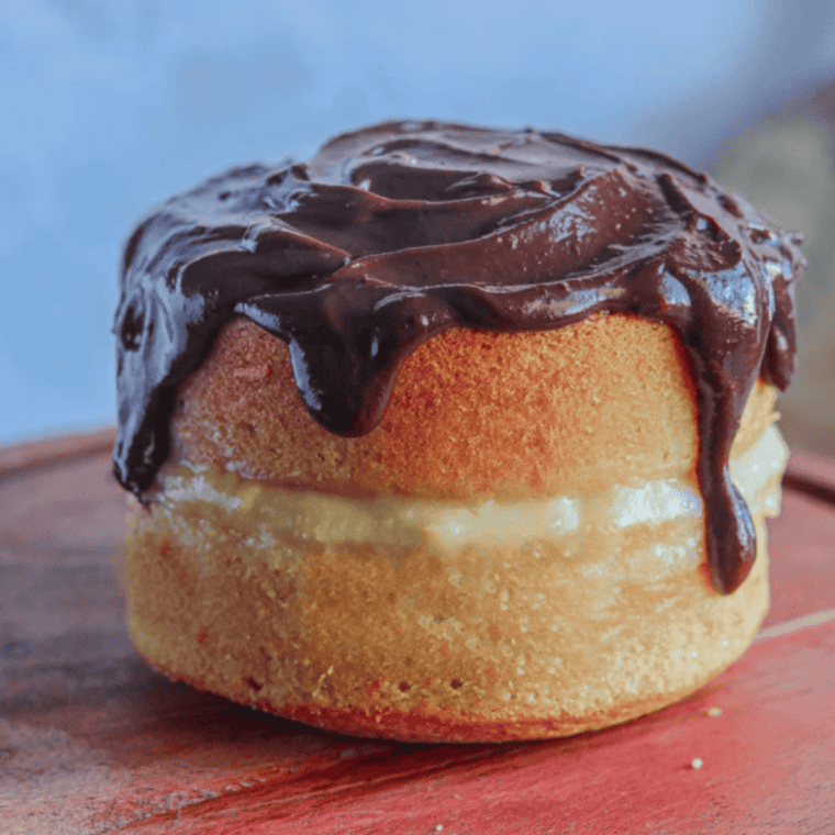 Make a classic dessert at home with this Easy Air Fryer Boston Cream Pie. Soft cake, creamy custard filling, and rich chocolate glaze come together quickly for a bakery-style treat.