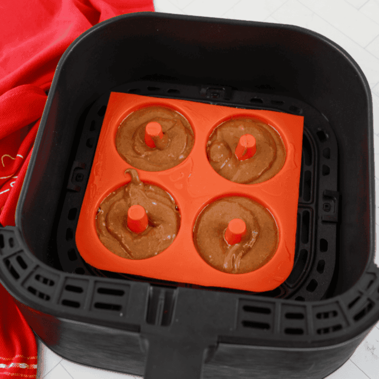 Filling silicone donut pan and air frying donuts at 320&deg;F