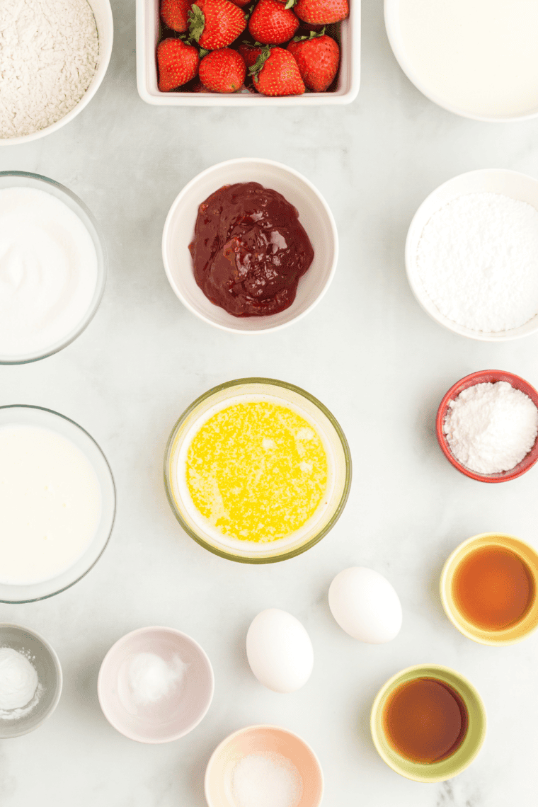 Ingredients needed for Air Fryer Homemade Yellow Cupcakes on kitchen table.