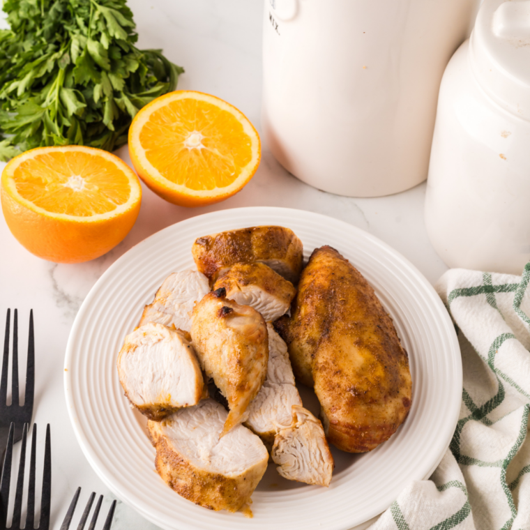Juicy air fryer turkey cutlets with golden browned edges sliced and served on a plate ready to eat