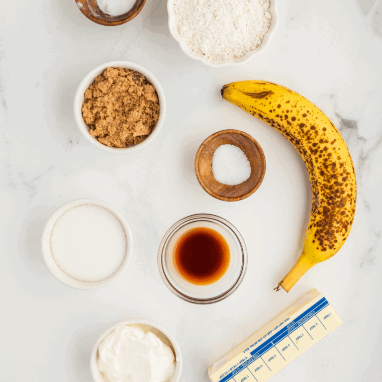 Ingredients needed for Easy Banana Cardamom Muffins on kitchen table.