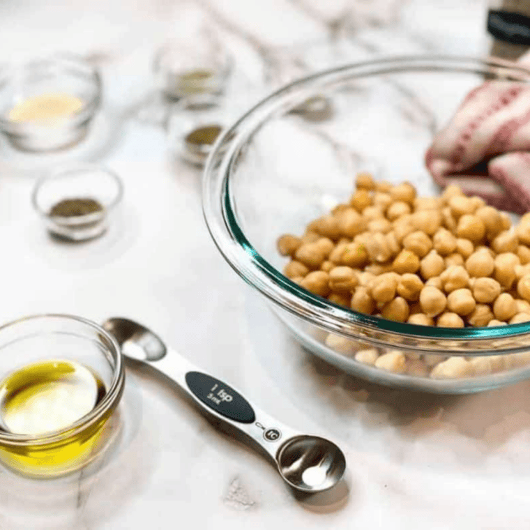 Ingredients for air fryer honey cinnamon roasted chickpeas: chickpeas, olive oil, honey, cinnamon, sugar, and salt