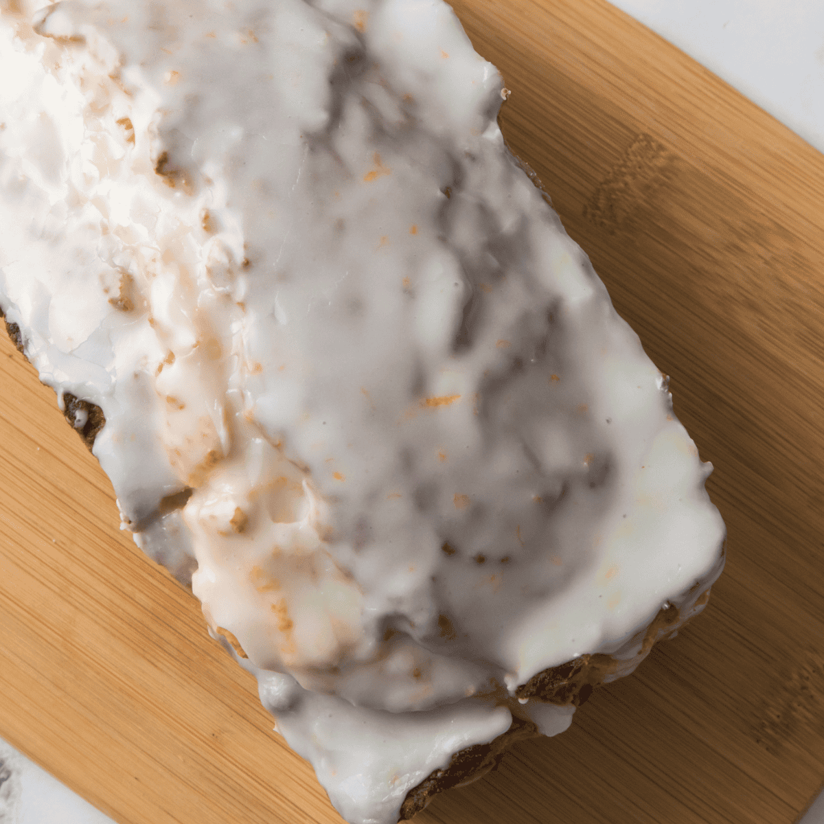 Easy Air Fryer Lemon Poppy Seed Bread on cutting board.