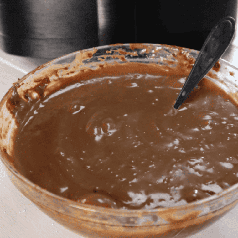 Brownie batter being mixed in a bowl for Air Fryer S'mores Brownies
