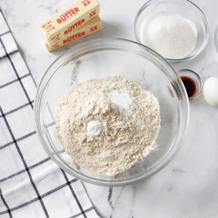 Ingredients needed for Air Fryer Banana Nut Muffins on kitchen table.
