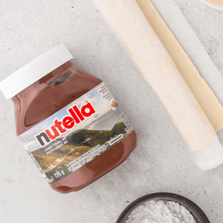 Ingredients needed for Air Fryer 3-Ingredient Nutella Cookies on kitchen table.
