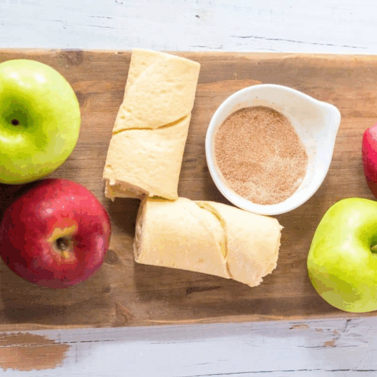 Ingredients needed for Easy Air Fryer Apple Pie Crescent Rolls on kitchen table.