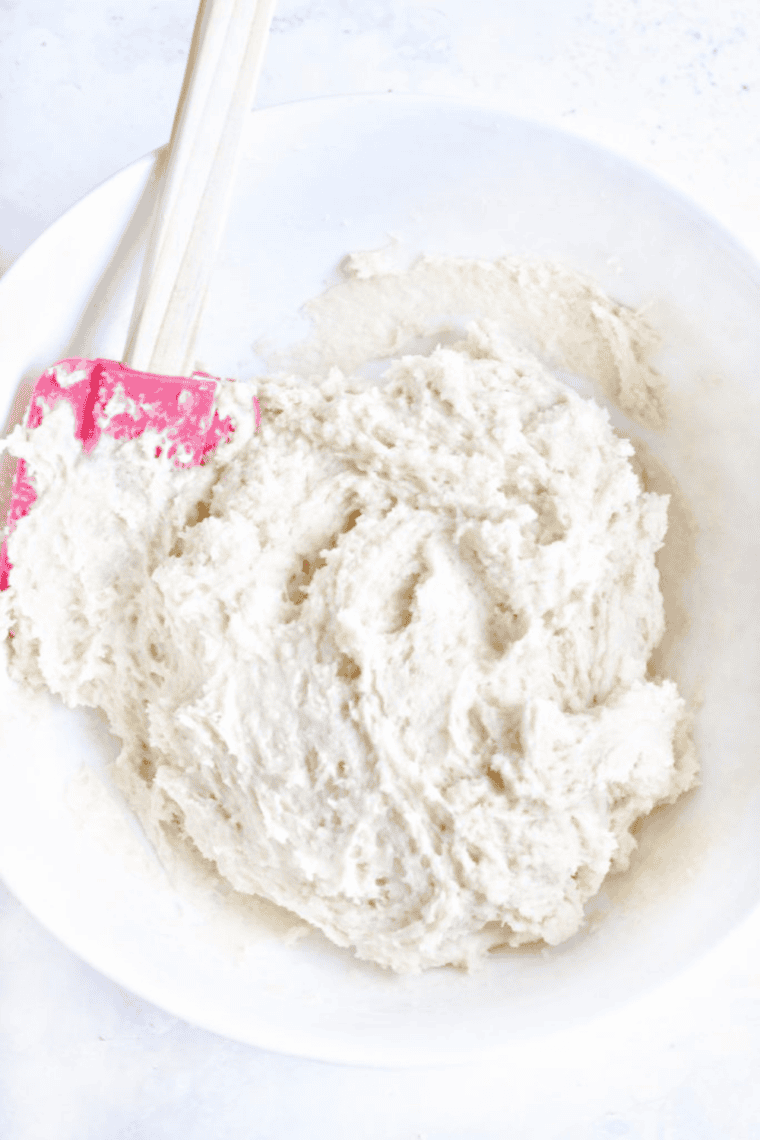 Mixing Betty Crocker cookie mix with ingredients to make dough.