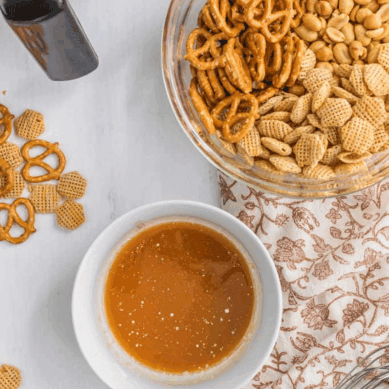 Mix melted butter, Worcestershire sauce, salt, garlic powder, and onion powder, then pour over Chex mix and toss with tongs.