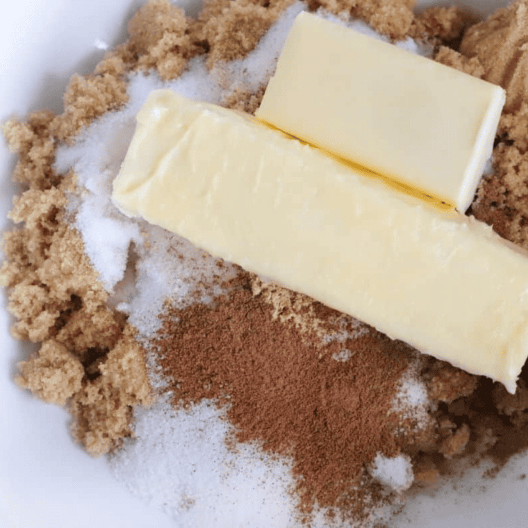 In a large bowl, beat the butter, granulated sugar, and brown sugar until light and fluffy.