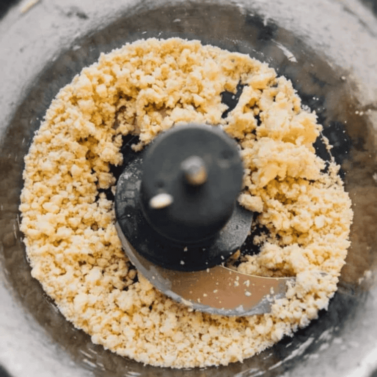 Flour, sugar, salt, and cold butter pulsed in a food processor until crumbly for galette dough