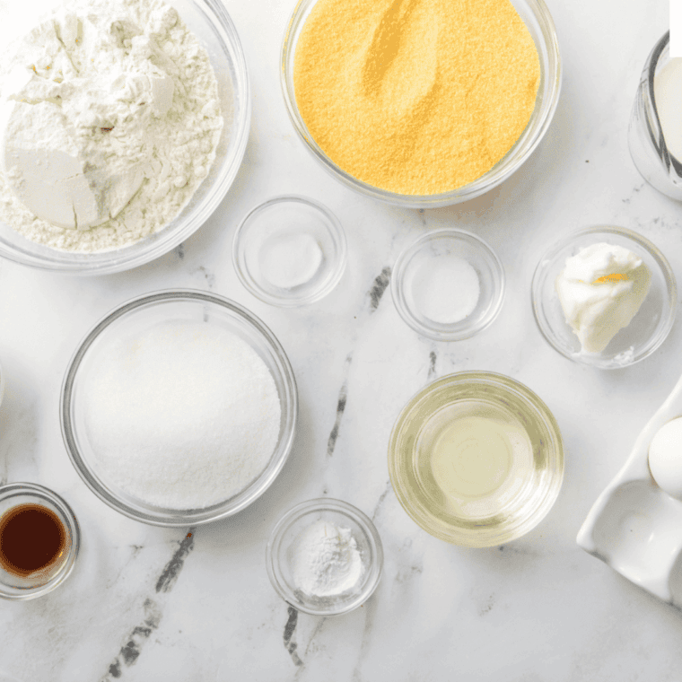 Ingredients needed for Easy Air Fryer Pumpkin Cornbread on kitchen table.