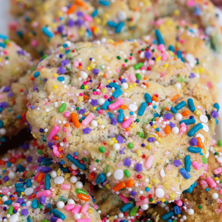 Freshly baked confetti cookies in the air fryer, soft, golden, and filled with colorful sprinkles.