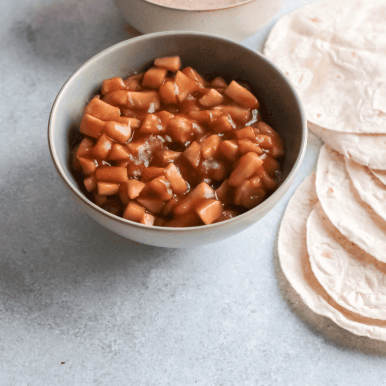 Ingredients for air fryer apple pie taquitos: tortillas, apple pie filling, butter, cinnamon and sugar