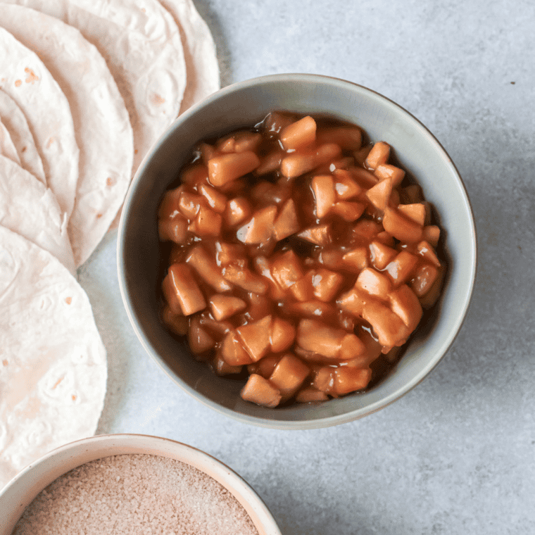Apple pie filling spooned onto a tortilla and rolled into a taquito