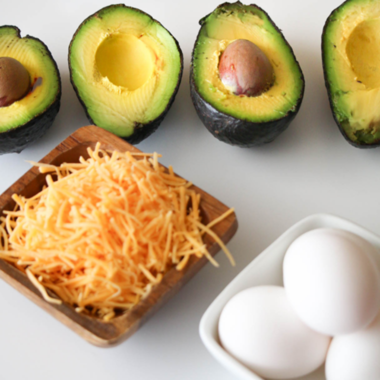 Ingredients needed for Easy Avocado Egg Air Fryer Recipe on kitchen table.