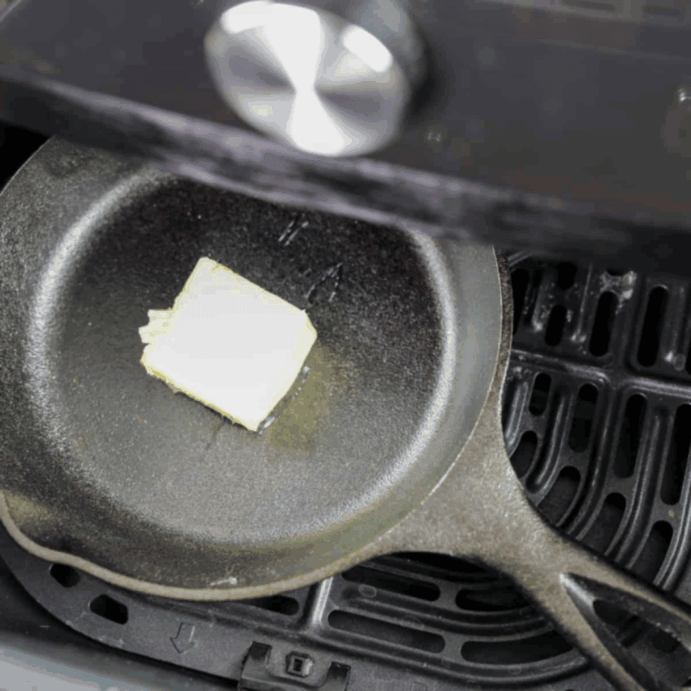 Melting butter in a skillet placed inside the air fryer at 400&deg;F