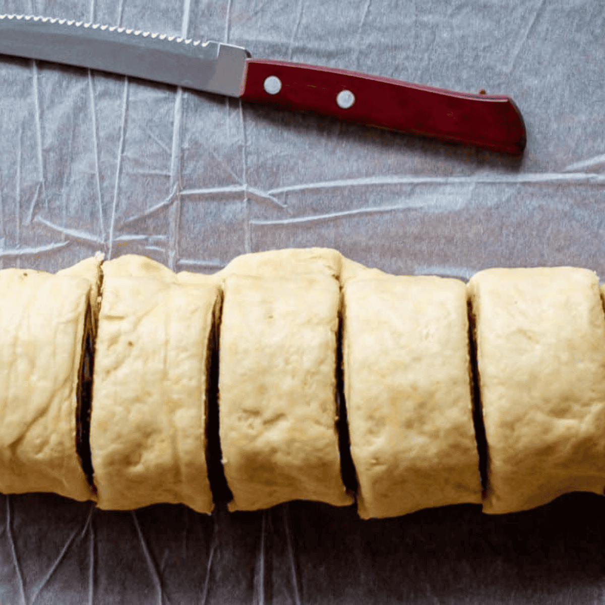 Ingredients needed for Air Fryer Cinnamon Roll Coffee Cake on kitchen table.