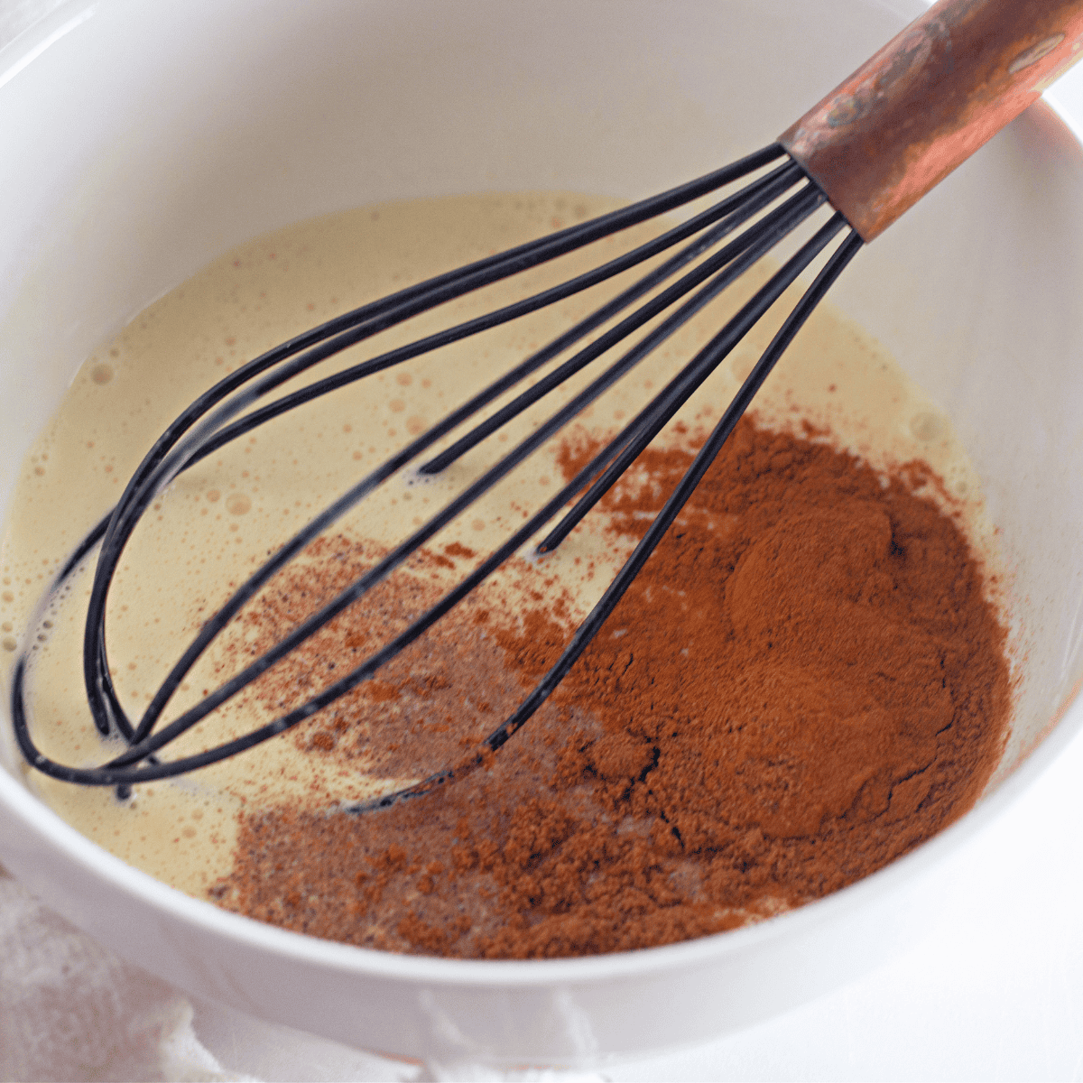 Preparing the pan with olive oil and spreading butter brown sugar mixture evenly on the bottom of the pan