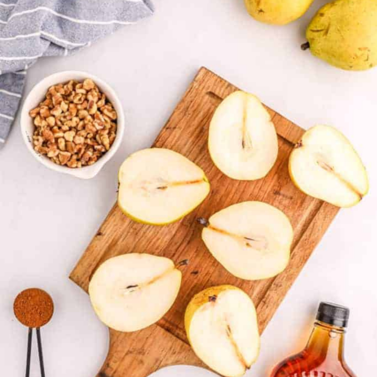 Three ingredients for a pear galette: refrigerated pie crust, fresh Bosc pears, and unsalted butter