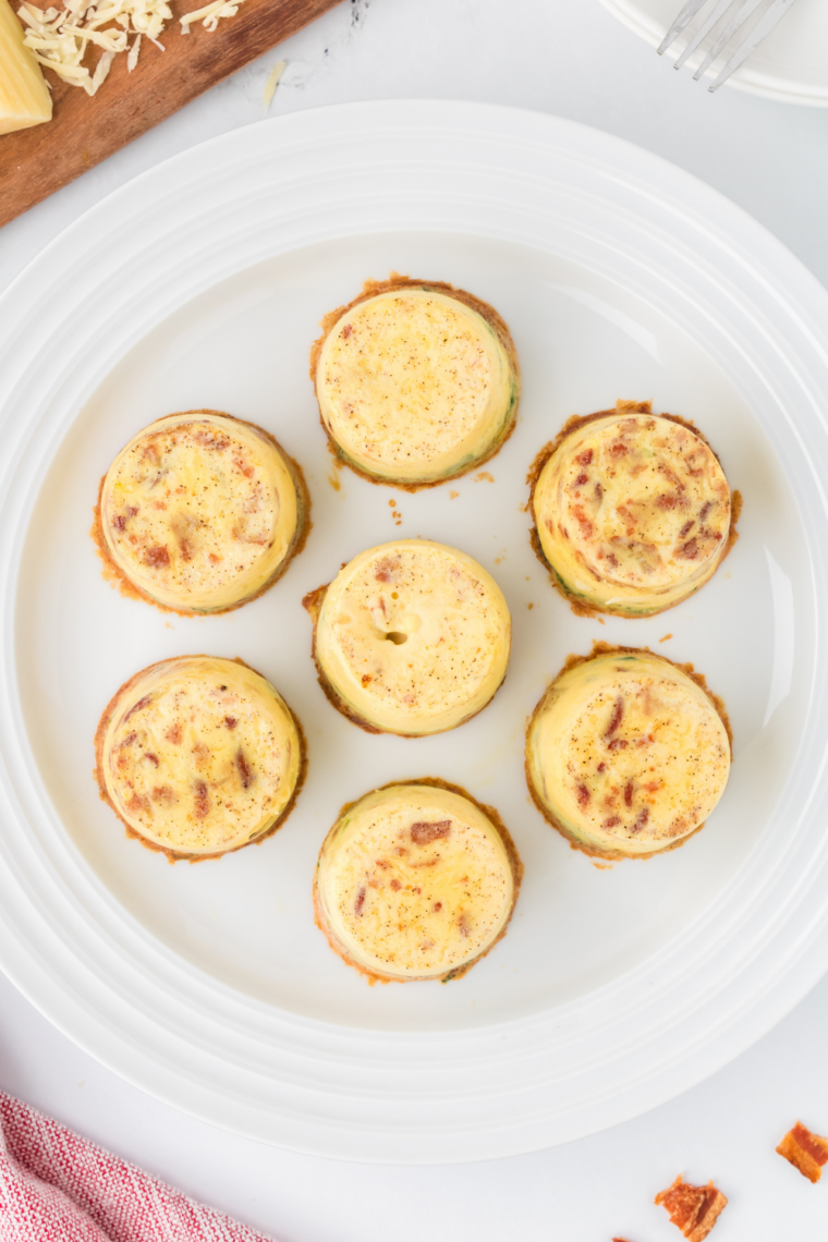 Cooling cooked egg bites slightly before popping out of molds