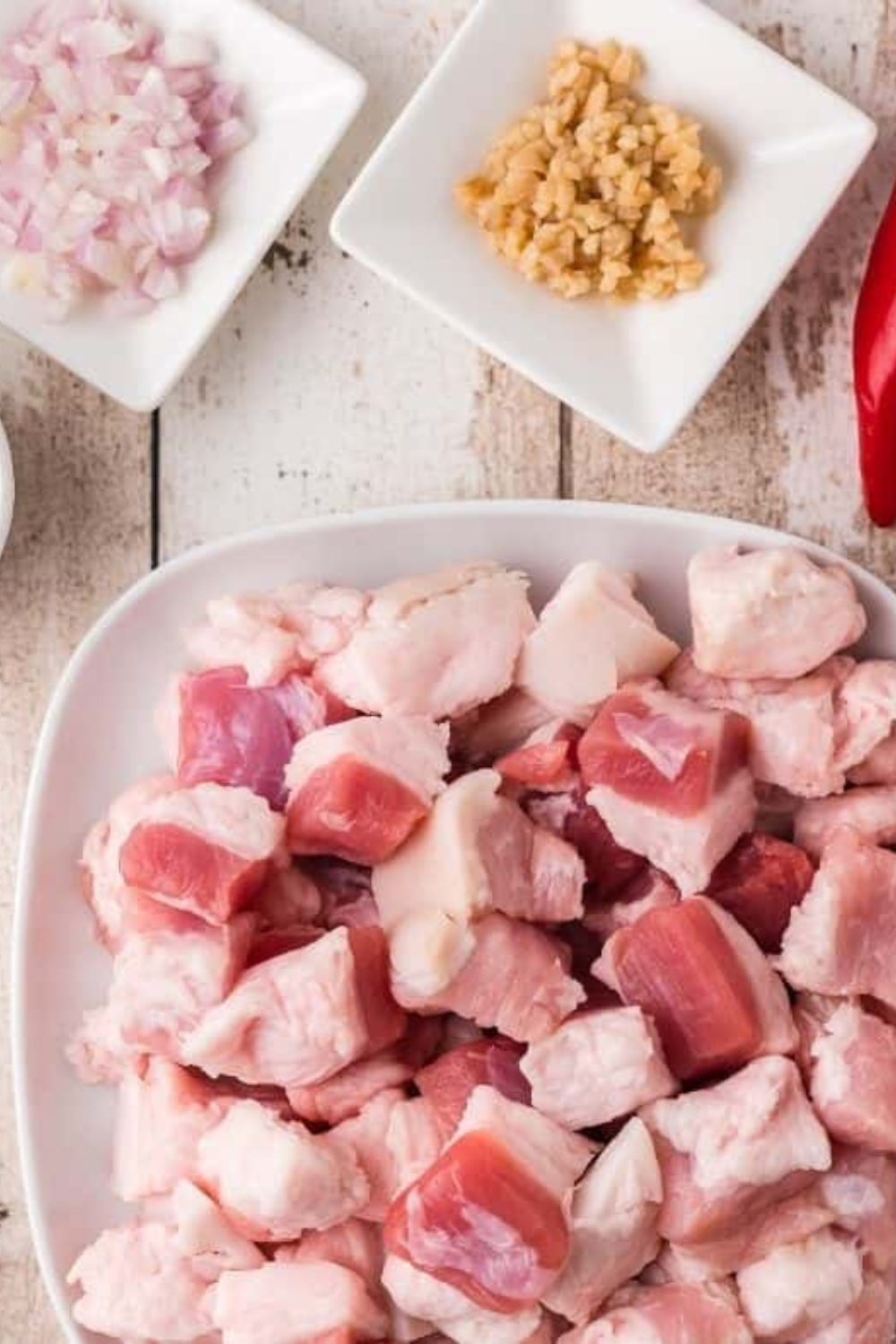Ingredients needed for Crispy Air Fryer Pork Belly Bites with Spicy Ginger Sauce | 30-Min Recipe on kitchen table.