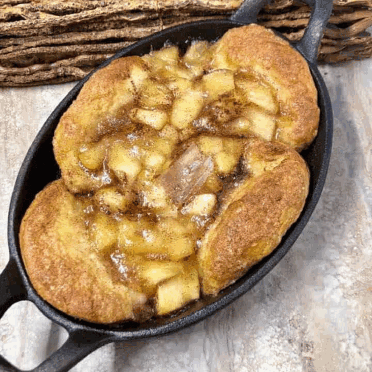 Air fryer skillet apple pie biscuit bites, golden and filled with cinnamon-spiced apples