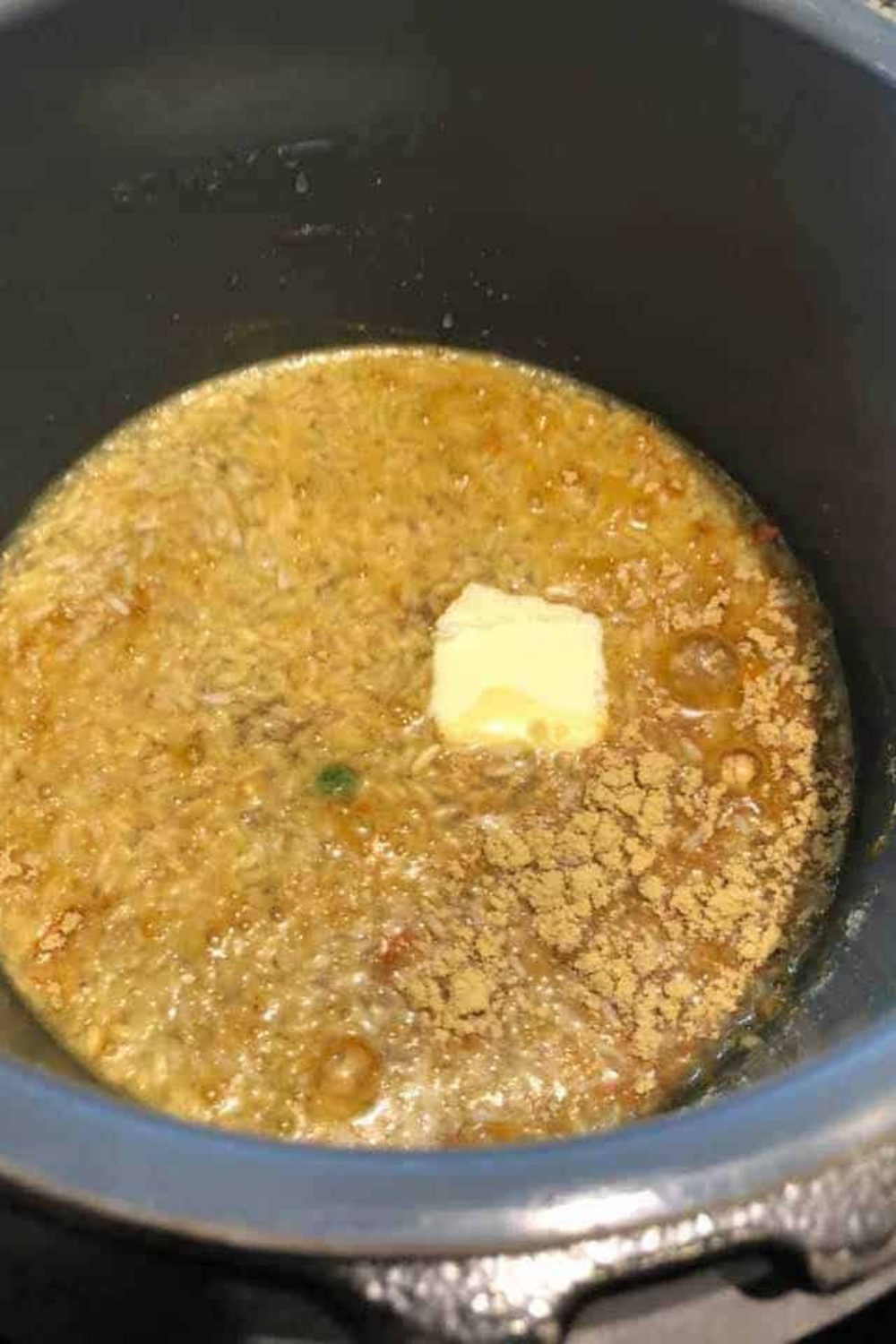Adding Knorr rice, water, and butter into the Instant Pot before sealing