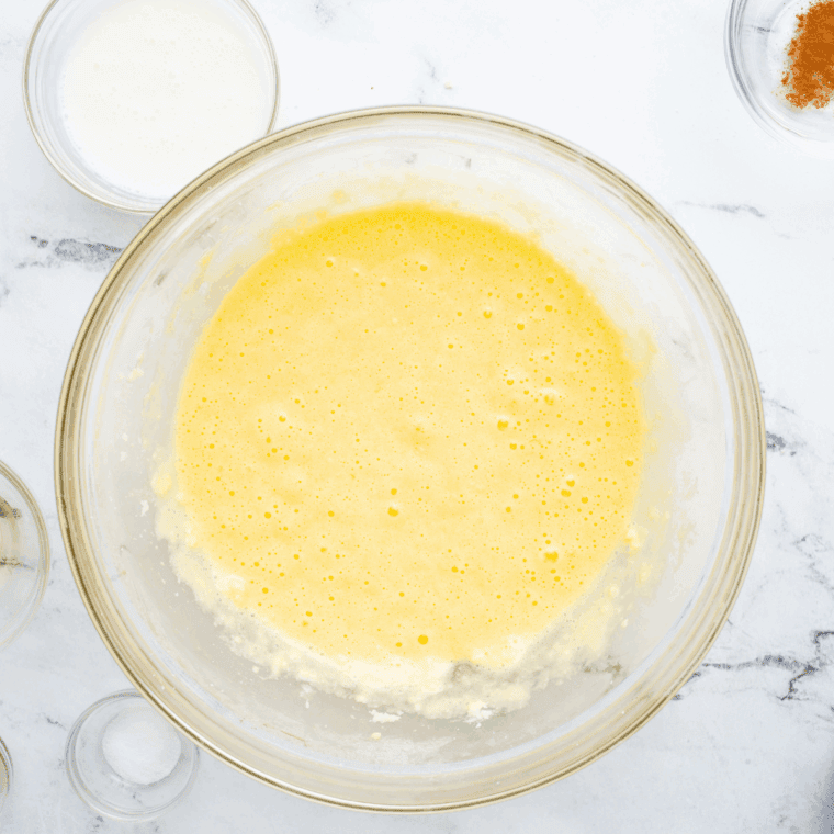 Mixing flour, sugar, baking powder, salt, and shortening until crumbly