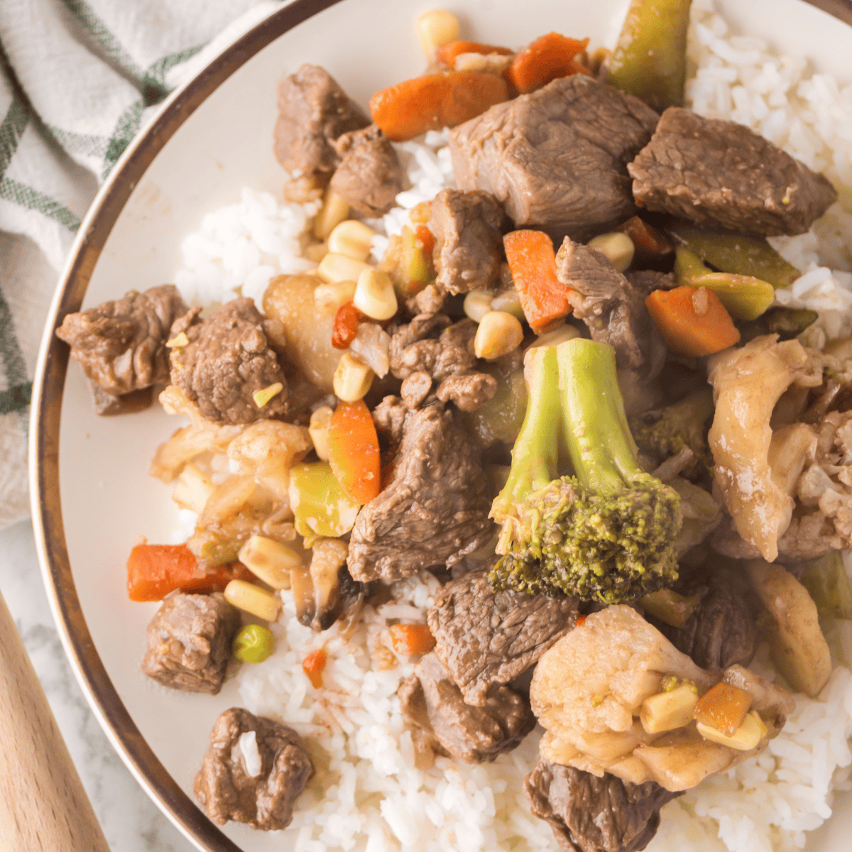 Ninja Foodi Beef Stir Fry with colorful vegetables in a skillet