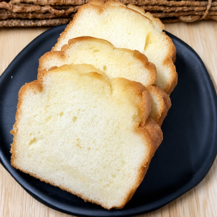 Baked pound cake turned out of the pan onto a wire cooling rack
