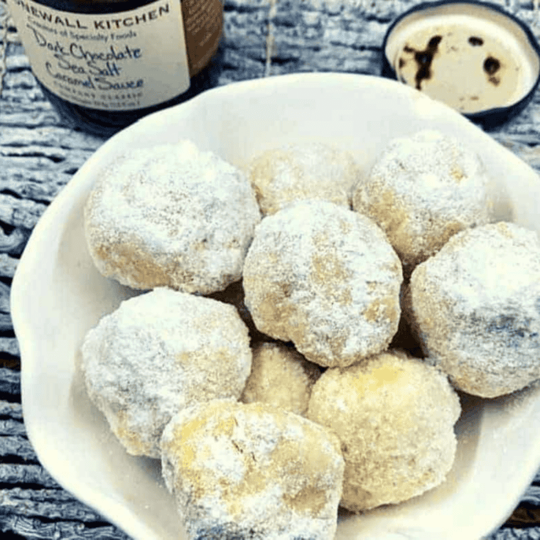 Hot air fryer donut holes dipped in melted butter and rolled in cinnamon sugar mixture.