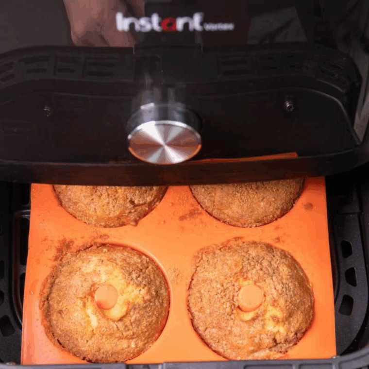 Place Cinnamon Crumb Donuts in the air fryer basket.