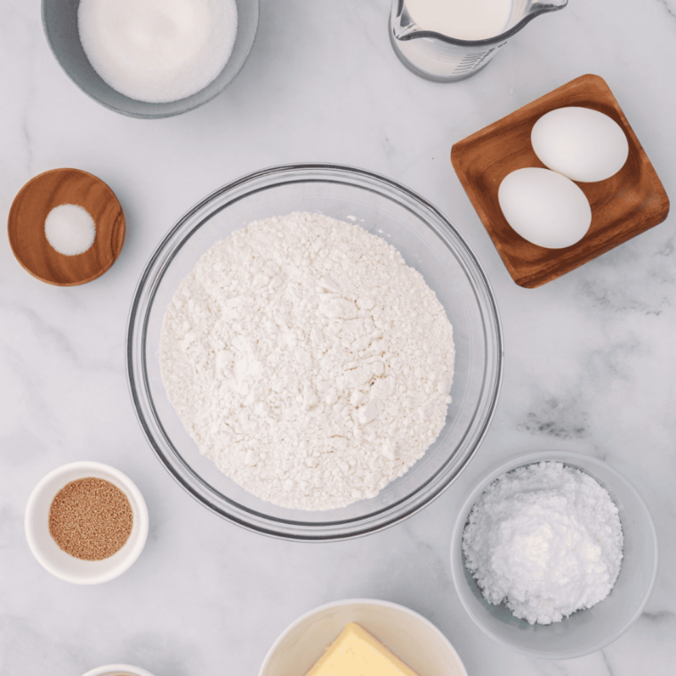 Ingredients for air fryer raspberry lemon bread measured into bowls
