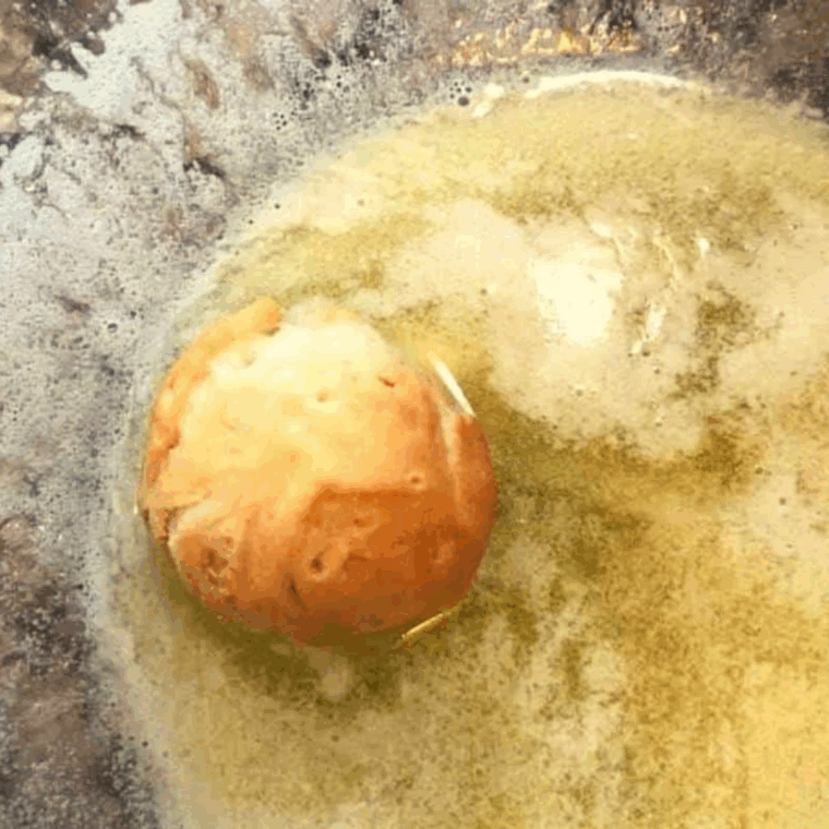 Dip the donuts into the butter.