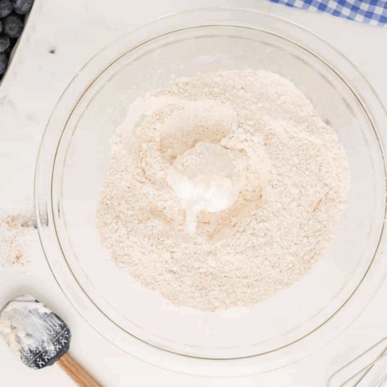 Ingredients needed for Easy Air Fryer Powdered Sugar Donut Holes on kitchen table.