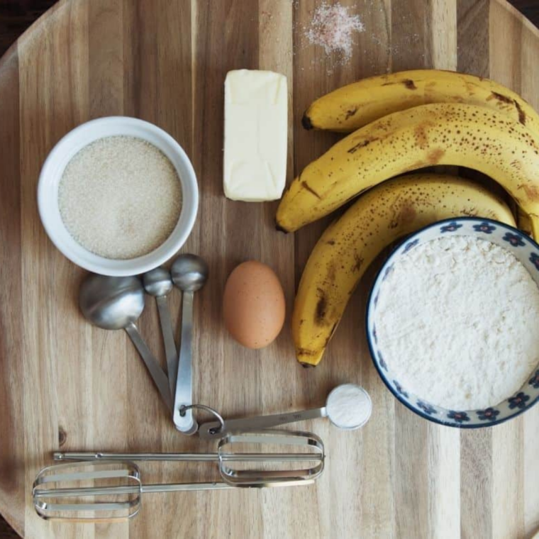 Ingredients needed for Air Fryer Banana Nut Bread (Moist & Easy Recipe) on kitchen table.