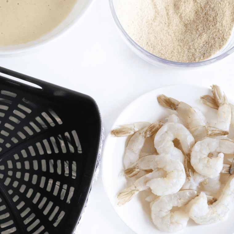 Ingredients needed for Easy Southern Fried Shrimp Recipe on kitchen table.