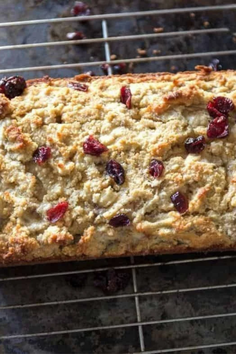 Mini cranberry orange nut bread loaves cooling on a wire rack after air frying