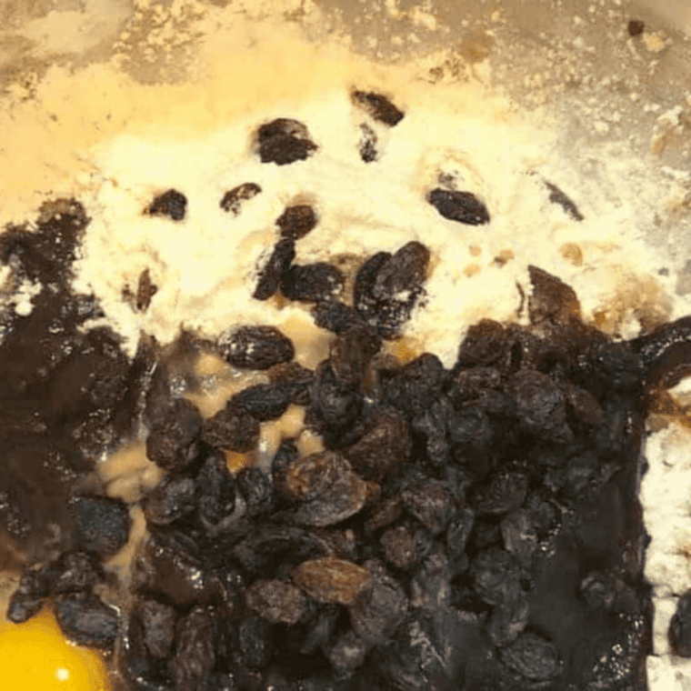  Apple butter bar batter with raisins mixed in a bowl