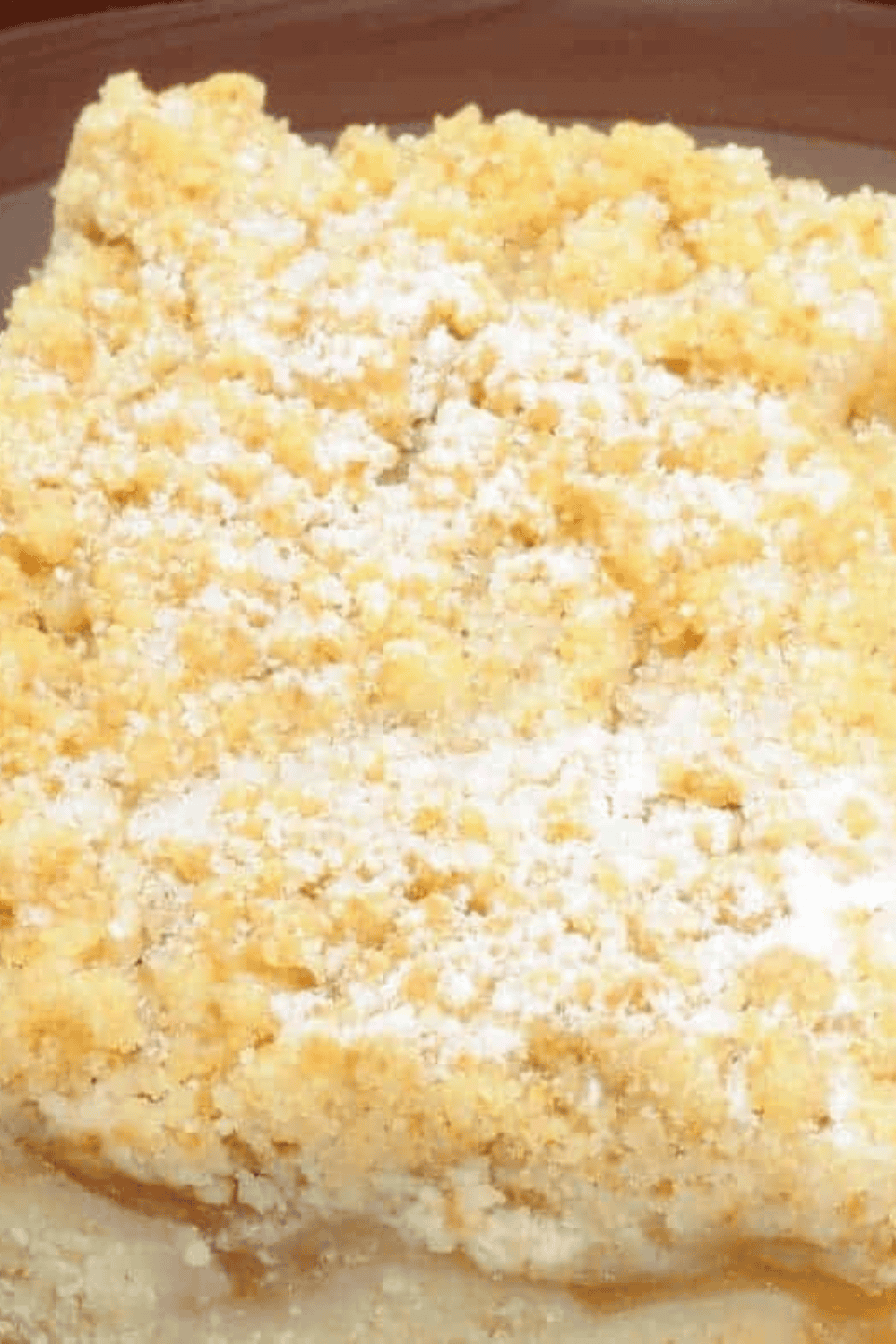 Air Fryer Apple Streusel Quick Bread slice showing crumbly cinnamon streusel topping.