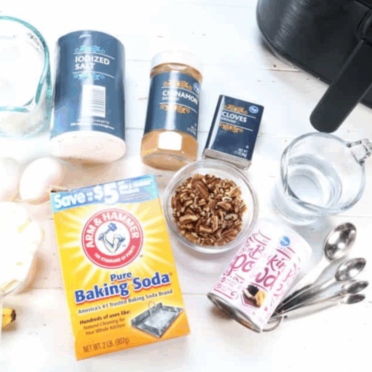 Ingredients needed for Air Fryer Blueberry Zucchini Bread on kitchen table.